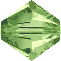 Tupis Swarovski / 6mm / Orificio 1mm / Peridot / Paquete de 20 unidades